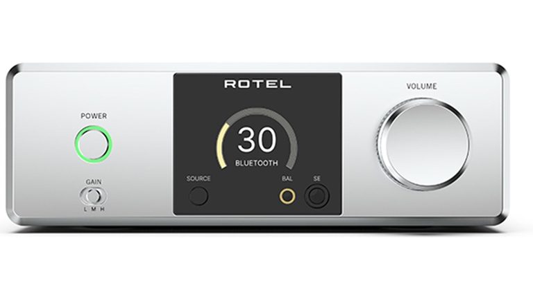 Rotel DX-3 headphone amplifier with front volume knob and headphone jack, compact hi-fi unit