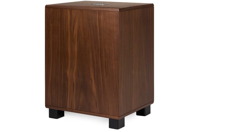 REL Classic 99 subwoofer in walnut finish, standing on black feet